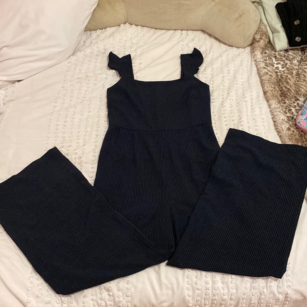 Navy jumpsuit with white stripes